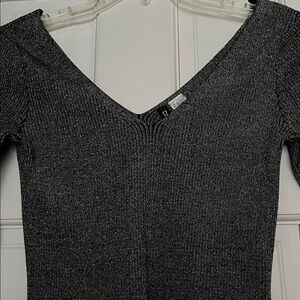 Brand new, beautiful V-Neck Long Sleeve Sweater with silver thread. Never worn.